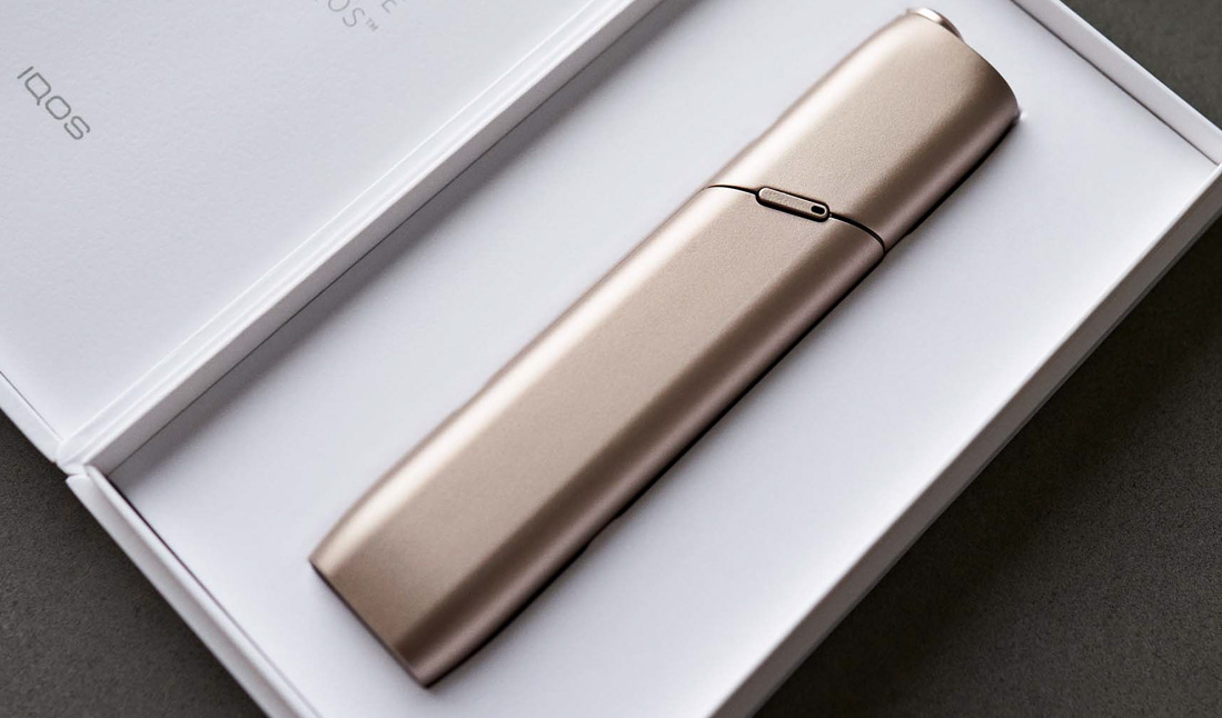 Gold IQOS 3 MULTI in its packaging