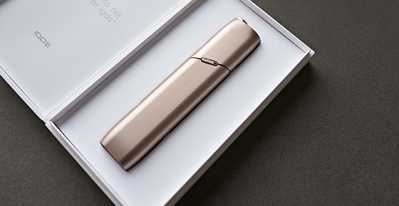 Gold IQOS 3 MULTI in its packaging