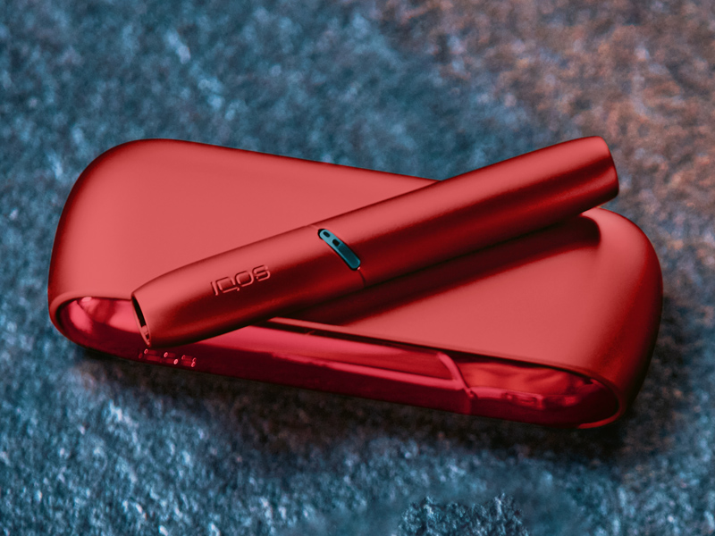 IQOS Originals Duo Holder and Pocket Charger in red color.