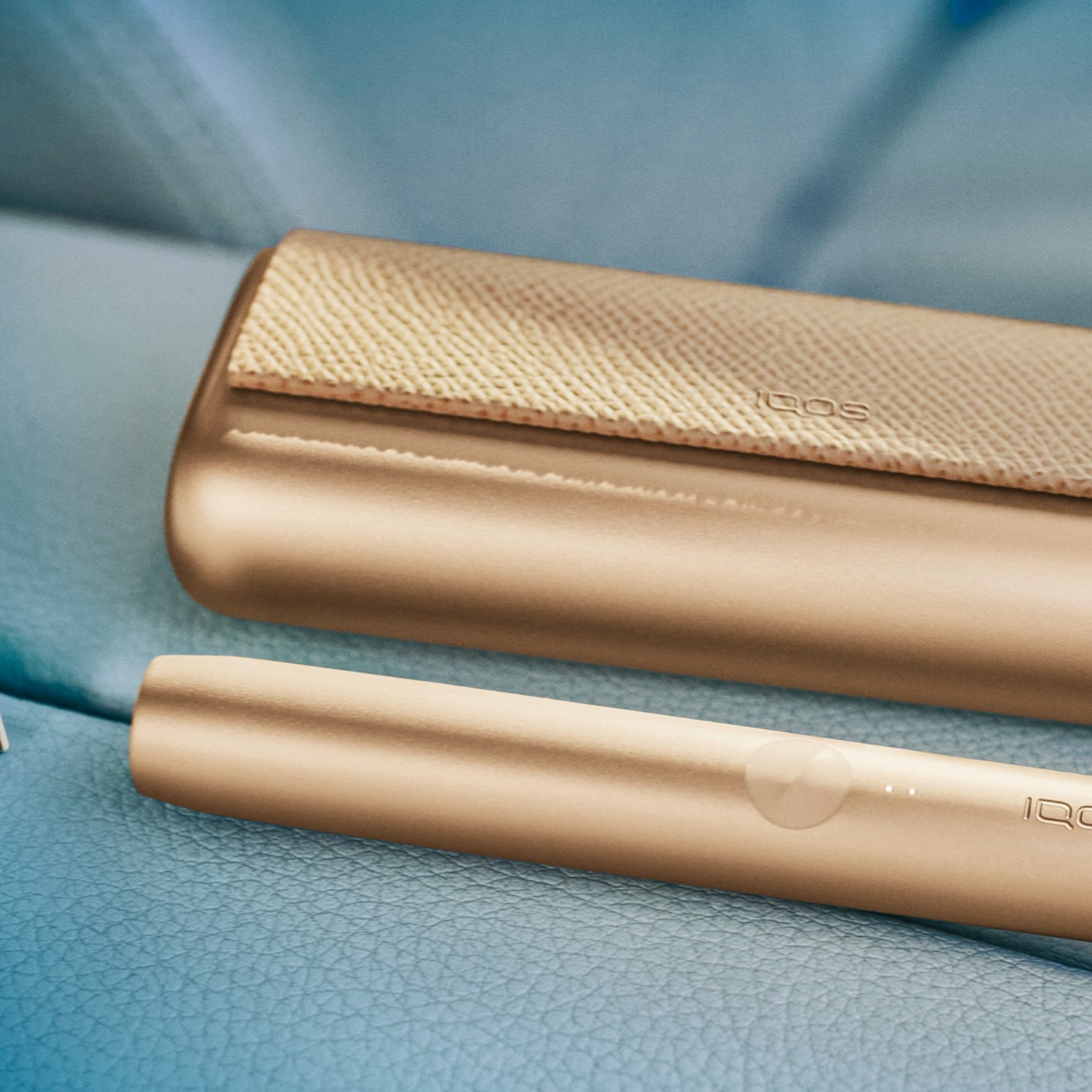 An IQOS ILUMA Prime gold khaki product.