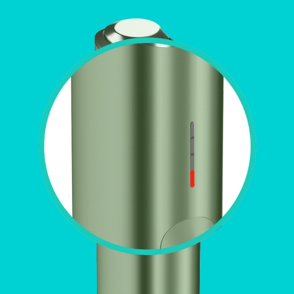 A close-up of one red light on IQOS ILUMA ONE device