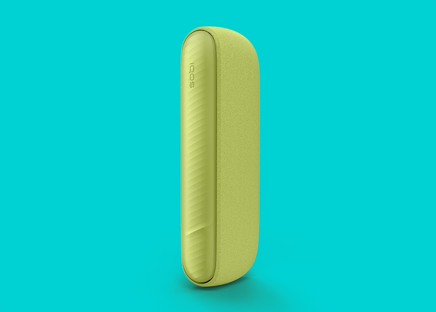 Green IQOS ILUMA i device on a turquoise background