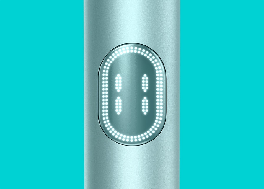 Breeze Blue IQOS ILUMA i device on a turquoise background - detail